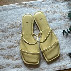 Zara. 37. Yellow sandals. Flats. Never worn. Closet scuffles only.